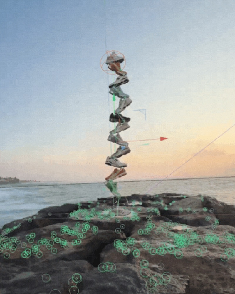 A technical mockup shows the sneaker stack tracked onto a rocky shoreline with digital points for placement