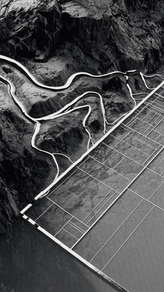 A black-and-white aerial 3D render shows a structured grid pattern merging into a rugged mountain landscape