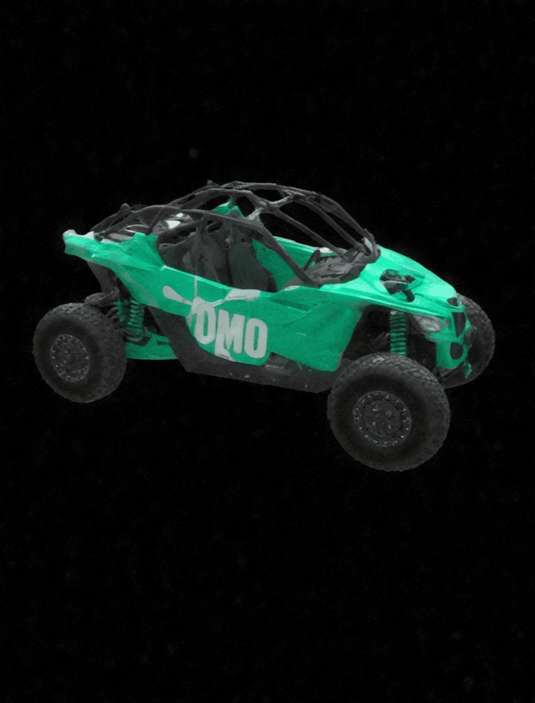 Gray-scale 3D models of an Omo-branded buggy